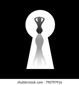 Shadow of a woman looking through the keyhole knob