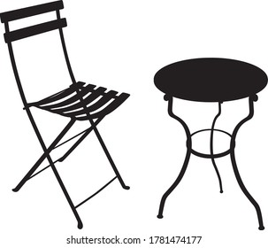 Shadow Of A Wrought Iron Garden Table And Chair