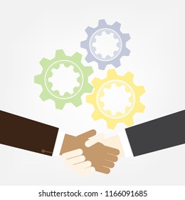 Shaking Hands with gear on background, Teamwork concept