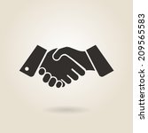 shaking hands on a light background