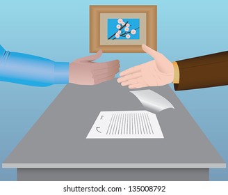 shaking hands over a signed agreement at the table in a meeting room