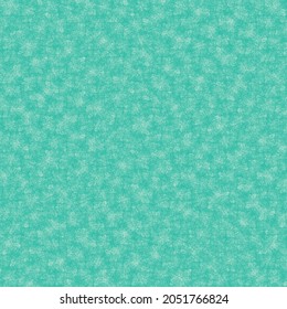 Shallow water, with pieces of crushed rock on the bottom. Stained turquoise wall. Grunge texture background.