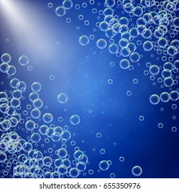 Shampoo foam diagonal frame with realistic water bubbles on blue background with sunshine flare. Cleaning liquid soap foam for bath and shower. Shampoo rainbow bubbles. Swimming pool flyer and invite.