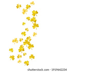 Shamrock background for Saint Patricks Day.  Lucky trefoil confetti. Glitter frame of clover leaves. Template for poster, gift certificate, banner. Celtic shamrock background.