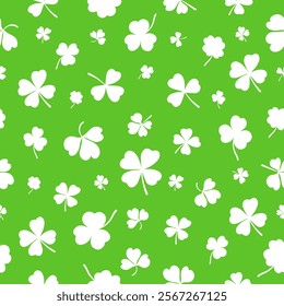 Shamrock or clover leaf flat design green seamless pattern falling leaves on white background vector illustration. Irish holiday celtic St Patrick day motif seamless pattern with shamrock clover leaf.