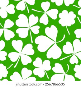 Shamrock or clover leaf flat design green seamless pattern falling leaves on white background vector illustration. Irish holiday celtic St Patrick day motif seamless pattern with shamrock clover leaf.