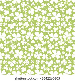 Shamrock or clover leaf flat design green seamless pattern falling leaves on white background vector illustration. Irish holiday celtic St Patrick day motif seamless pattern with shamrock clover leaf.