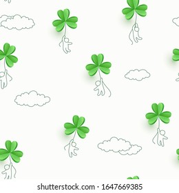Shamrock flying green leaves seamless pattern. Irish Good Luck concept background. Vector clover template for Saint Patrick's Day holiday greeting card design.
