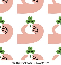 Shamrock in hand pattern for St. Patrick's Day