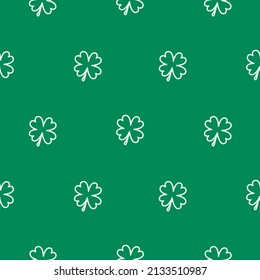 Shamrock leaf St. Patricks Day seamless pattern. Simple clover leaves on green background