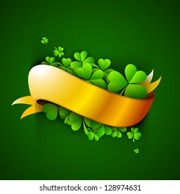 Shamrock leaves with golden ribbon.