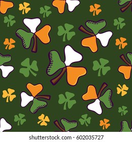 Shamrock Leaves on a dark green background. St.Patrick's Day.  Seamless Vector pattern for postcards, gift wrapping, scrapbook, wallpapers, textile, clothes and linen