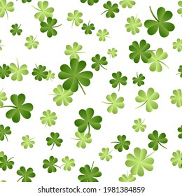 Shamrocks or four-leafed clover St. Patrick's Day symbol vector seamless pattern. Green foliage summer design. Irish clover plant leaves of 3 anf 4 parts. Lucky symbols. Shamrock isolated on white.