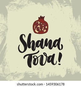 Shana tova jewish new year postcard. Vector vintage style hand drawn lettering quote postcard with symbol pomegranate. Vector greeting poster. 