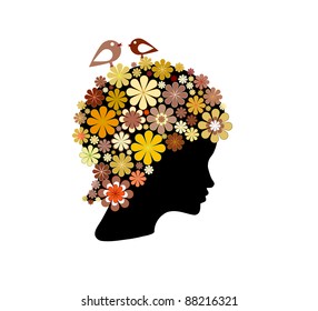 Shape of woman head covered with colorful flowers and birds