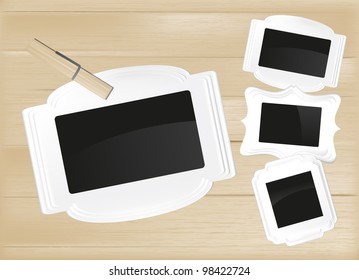 shaped frame set on wood background