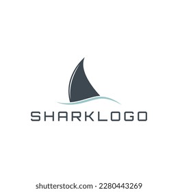 Shark fin over water simple logo symbol