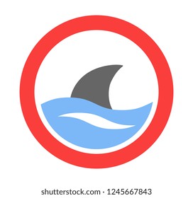 shark fin over wave