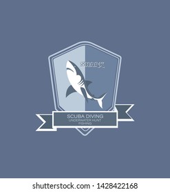 Shark, tape and shield. Emblem of the corporate club. Development of corporate identity design, thematic site, diving club and spearfishing.