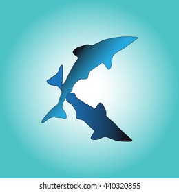 Sharks silhouettes on a blue background