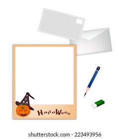 A Sharpened Pencil and Eraser Lying on Happy Jack-o-Lantern Pumpkin Photo Frame with A Postcard, Envelope and Smart phone for Halloween Celebration. 