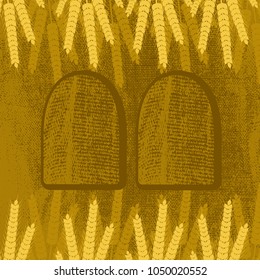 Shavuot. Concept of Judaic holiday. Ears of wheat and tablets. Brown background, burlap texture