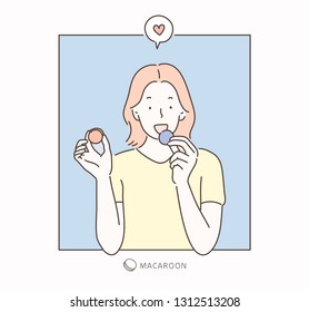 She is eating macaroons.hand drawn style vector design illustrations.