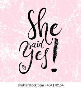 She said Yes. Engagement, bride. Vector isolated hand drawn hand lettering with abstract pink marble background texture. Printable wedding card template. Modern cute brush pen calligraphy. 