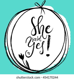 She said Yes. Engagement, bride, greeting invitation card. Vector isolated hand drawn hand lettering with elegant floral mint wreath. Printable wedding card template. Modern cute brush pen calligraphy