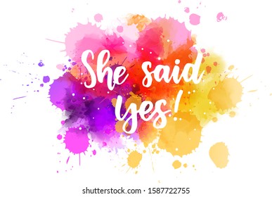 She said yes - handwritten lettering on watercolor splash. Multicolored. Inspirational illustration.