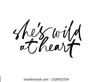 She is wild at heart ink pen handwritten lettering. Grunge brushstroke quote isolated vector calligraphy. Phrase freehand cursive inscription. Book cover, journal article headline design element