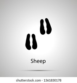 Sheep paws, steps imprints, simple black silhouette on gray