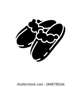 Sheepskin shearling slippers black glyph icon. Comfortable home shoes. Hygge style. Silhouette symbol on white space. Comfy knit bootie slippers. Coziness atmosphere. Vector isolated illustration