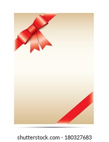 Sheet gold  paper and red ribbon with gift bow