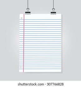 Sheet of lined paper hanging on clamps