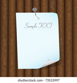 Sheet of paper beaten to a wooden wall