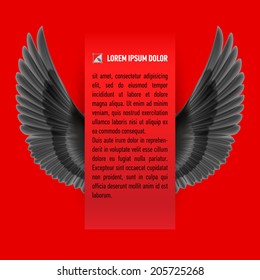 Sheet of paper with text with black wings up on both sides