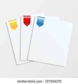 Sheets of white paper with colorful bookmarks and place for your text