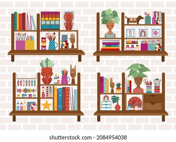 Shelf decor in creative home art studio. Artistic bookshelves with painting, drawing and hobby craft supplies, plants in face planters pots, books, stationary, wooden hands and decorative elements.