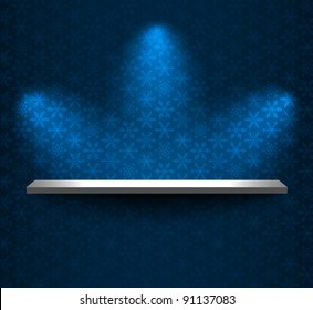 Shelf on the wall with snowflakes wallpaper