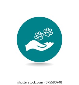 Shelter pets sign icon. Hand holds paw symbol. Animal protection