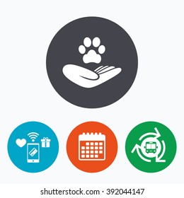 Shelter pets sign icon. Hand holds paw symbol. Animal protection. Mobile payments, calendar and wifi icons. Bus shuttle.