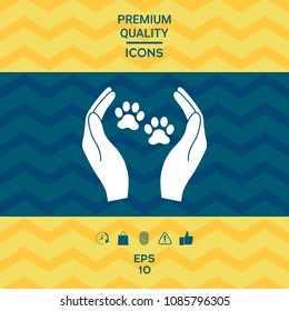 Shelter pets sign icon. Hands holds paw symbol. Animal protection