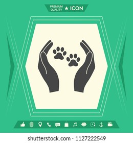 Shelter pets sign icon. Hands holds paw symbol. Animal protection
