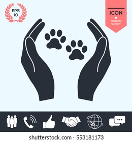 Shelter pets sign icon. Hands holds paw symbol. Animal protection