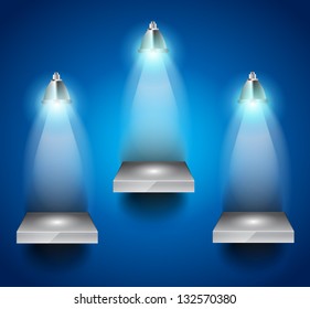 Shelves with 3 LED spotlights with delicate look on a blue wallpaper. Shadows are transparent.