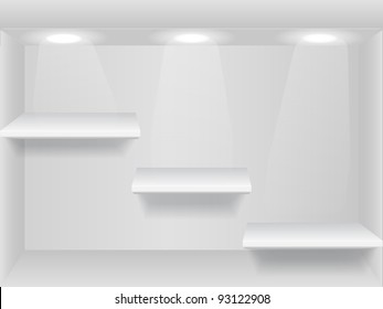 Shelves with lights on the wall