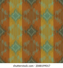 Shibori style ikat vector seamless vector pattern background. Scribbled diamond shapes ochre, green striped backdrop. Weave effect repeat. Simulated woven geometric all over print wellness, packaging