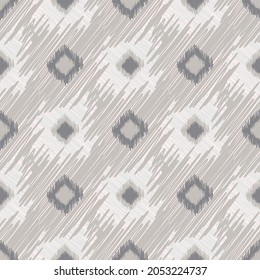Shibori style ikat vector seamless vector pattern background. Scribbled diamond shapes backdrop in monochrome ecru beige. Weave effect repeat. Woven geometric all over print wellness, packaging