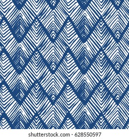 Shibori zig zag indigo triangles print. Geometrical japanese seamless pattern